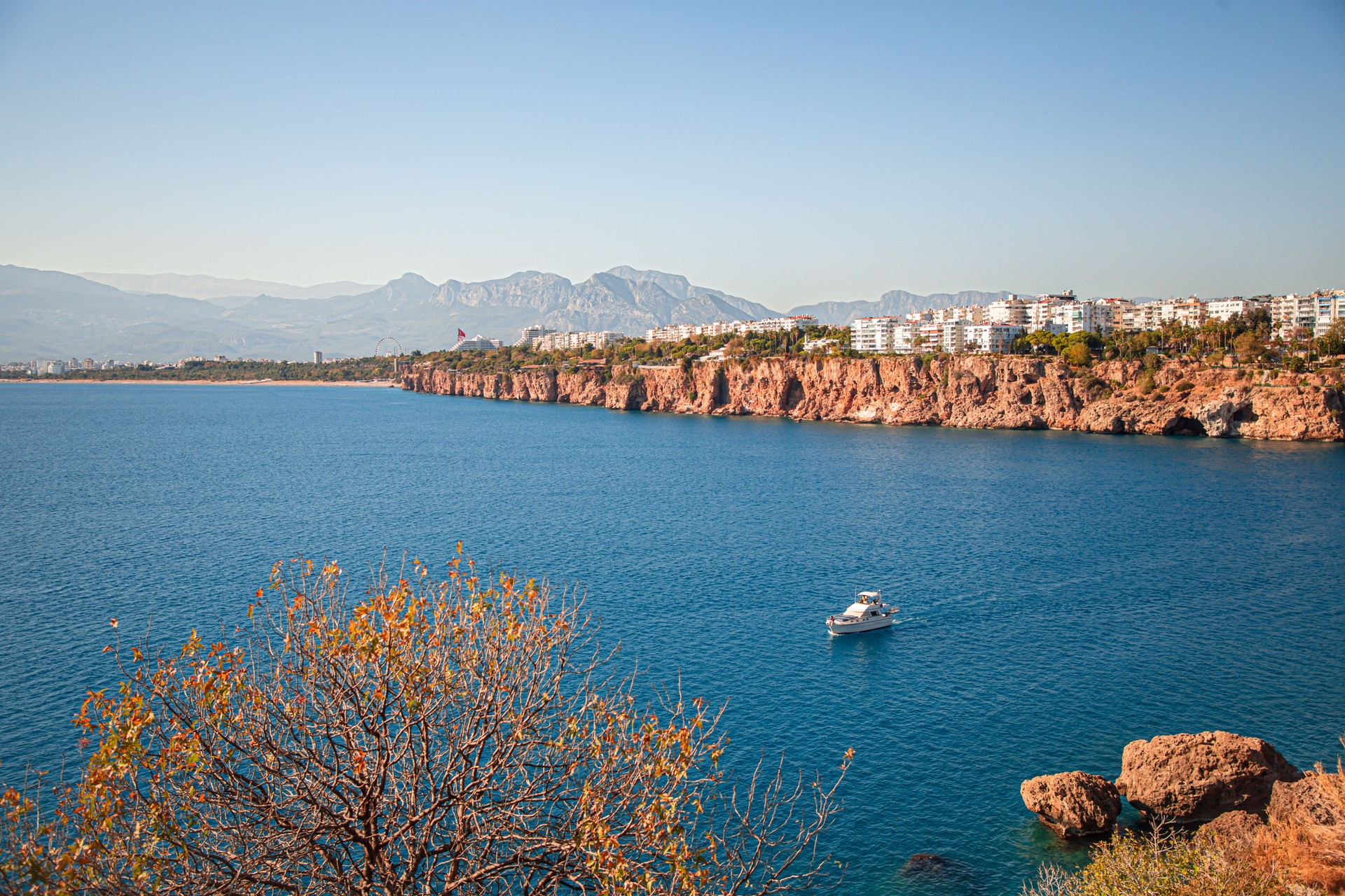 Scenic View of Antalya’s Kalici Old Town with Yacht on the Mediterranean Sea